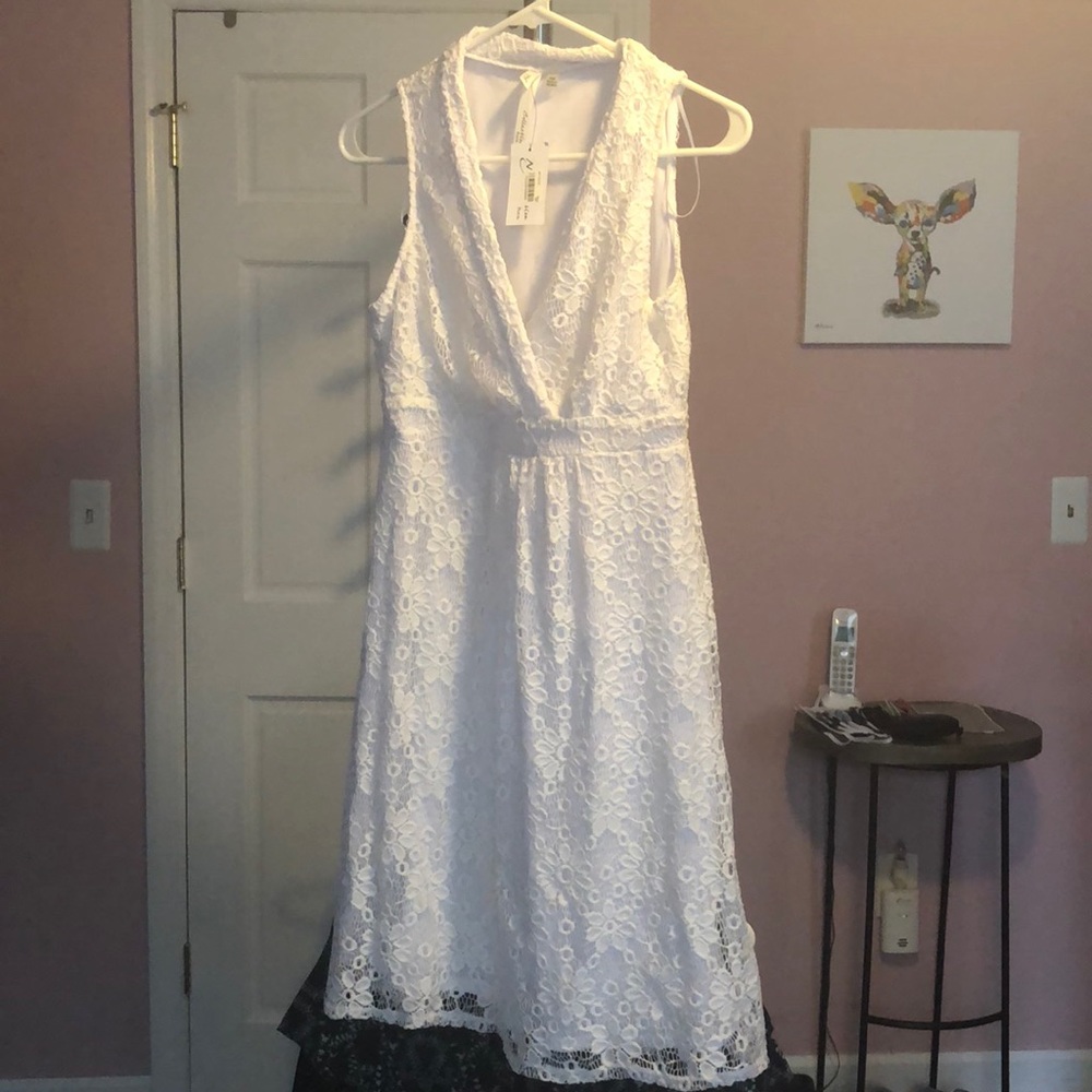 White sleeveless embroidered flower dress